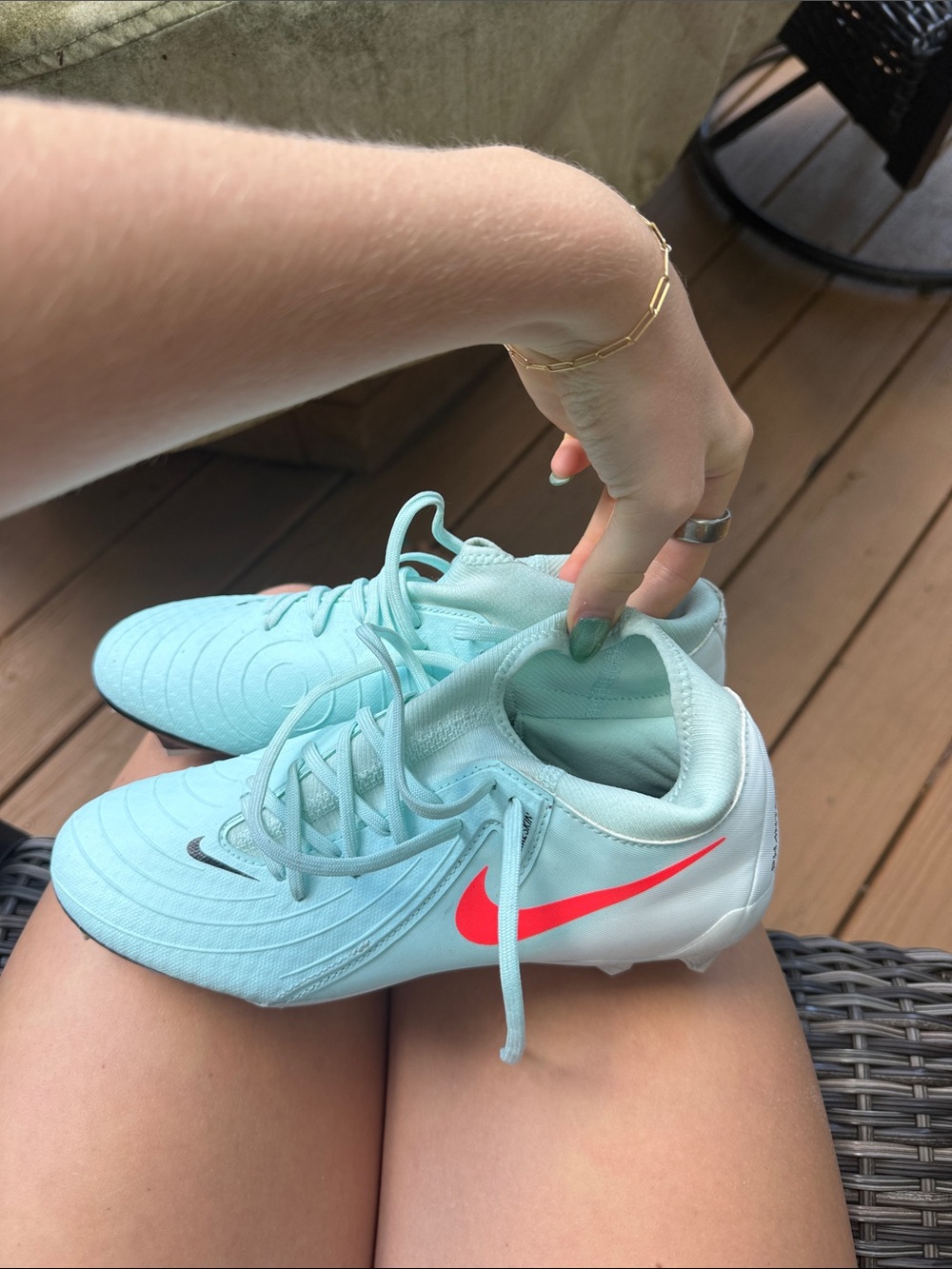 Nike Women's Light Blue Teal Athletic Cleats with Pink Swoosh